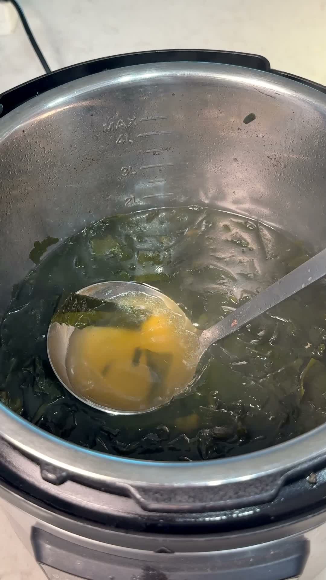 Seaweed simmering in the broth for seaweed soup