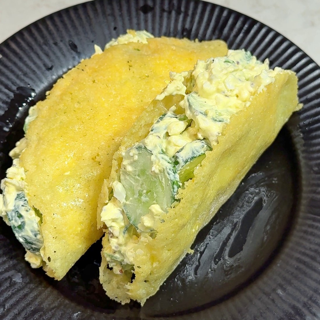 Cheese shell folded around the filling