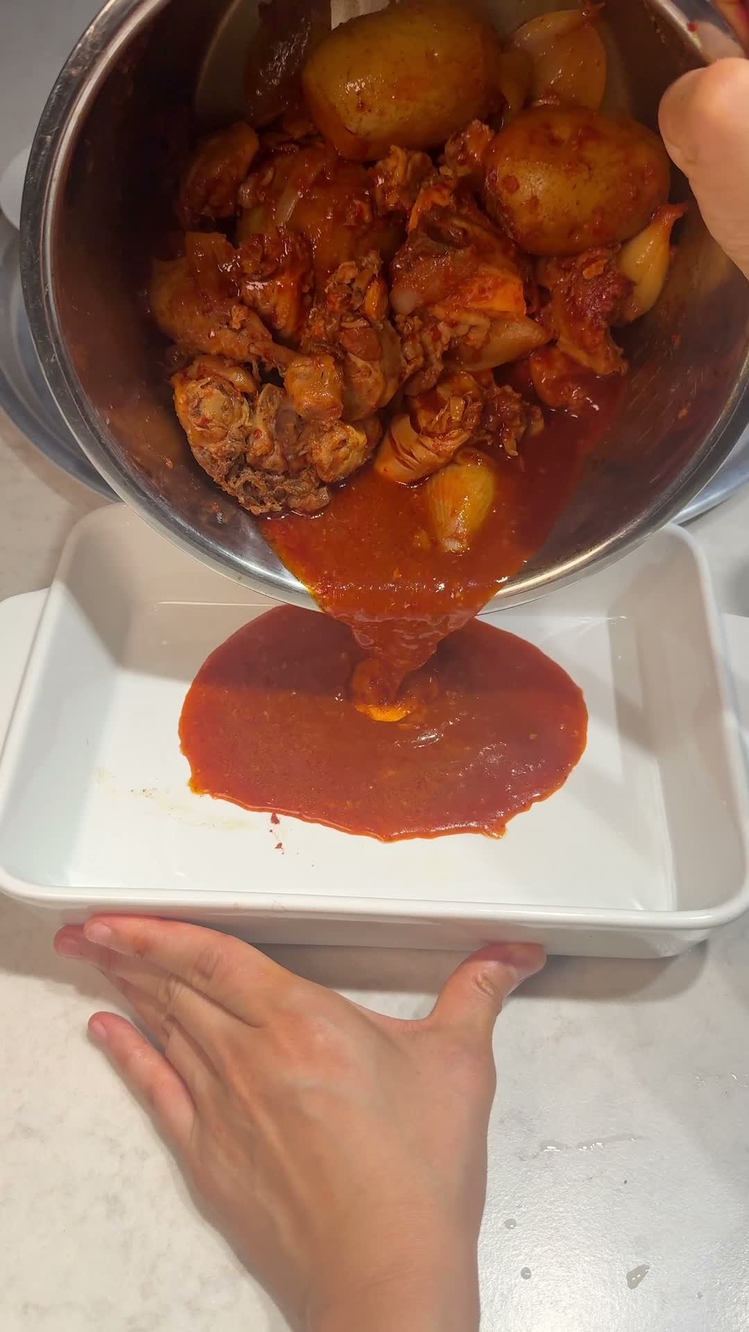 Chicken stew poured into a serving tray