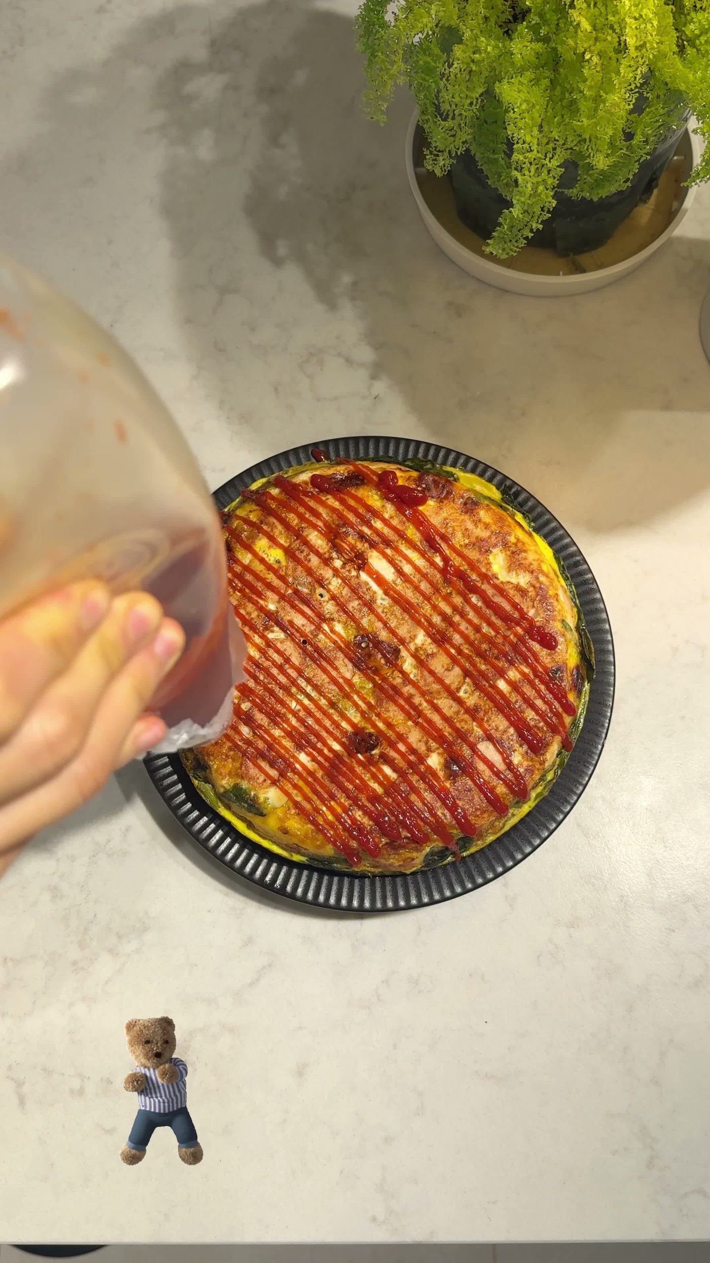 Finished frittata drizzled with sauce